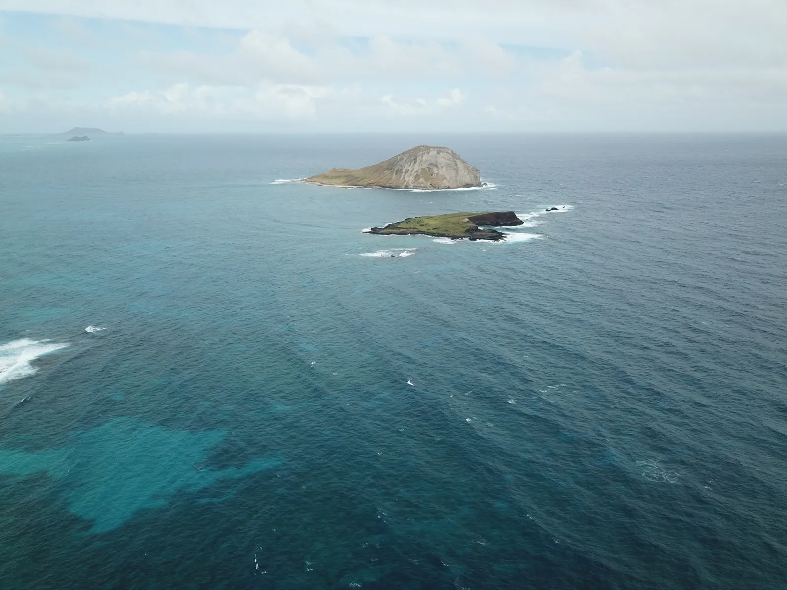 Tropical Storm Lowell strengthens slightly, Karina continues westward on track toward Hawaii